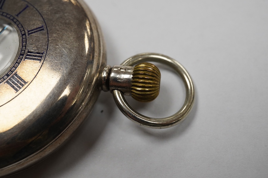 A George V silver J.W. Benson keyless half hunter pocket watch, with Roman dial and subsidiary seconds, case diameter 49mm. Condition - poor to fair